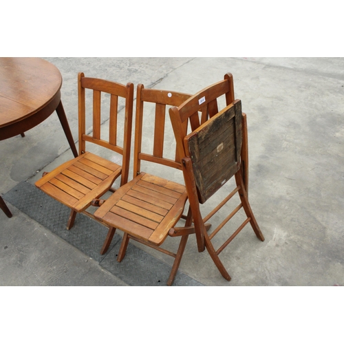 2810 - THREE MID 20TH CENTURY FOLDING PATIO CHAIRS