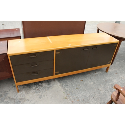 2817 - A RETRO GORDON RUSSELL STYLE SIDEBOARD ENCLOSING THREE DRAWERS AND TWO CUPBOARDS, 73