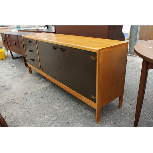 2817 - A RETRO GORDON RUSSELL STYLE SIDEBOARD ENCLOSING THREE DRAWERS AND TWO CUPBOARDS, 73