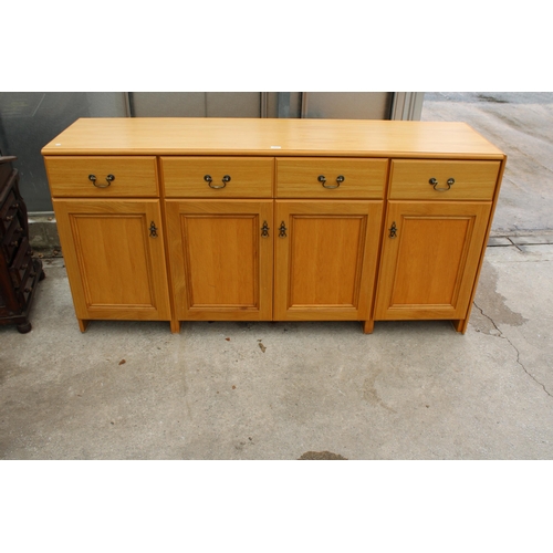 2825 - A MODERN OAK EFFECT SIDEBOARD ENCLOSING FOUR DRAWERS AND FOUR CUPBOARDS, 72