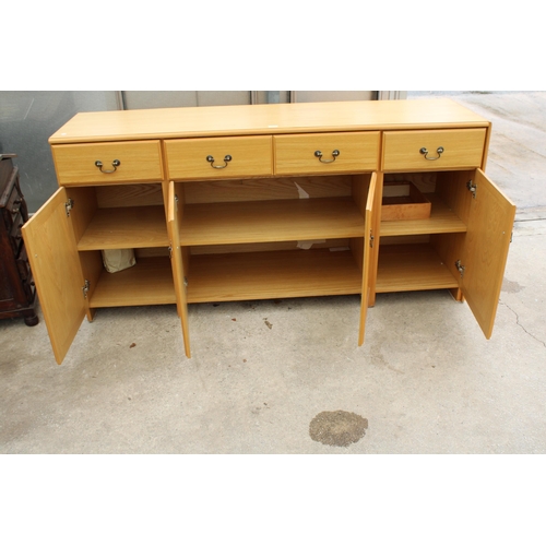 2825 - A MODERN OAK EFFECT SIDEBOARD ENCLOSING FOUR DRAWERS AND FOUR CUPBOARDS, 72