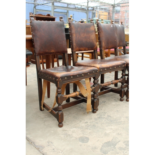 2827 - A SET OF FOUR OAK STUDDED LEATHER JACOBEAN STYLE DINING CHAIRS