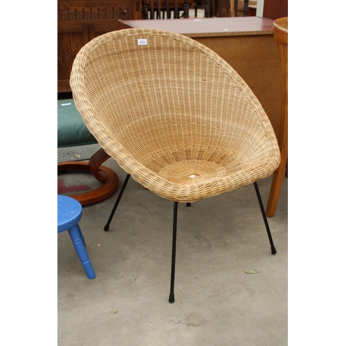 2839 - A WICKER TUB CHAIR ON METAL LEGS