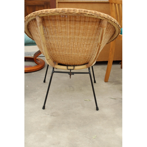 2839 - A WICKER TUB CHAIR ON METAL LEGS