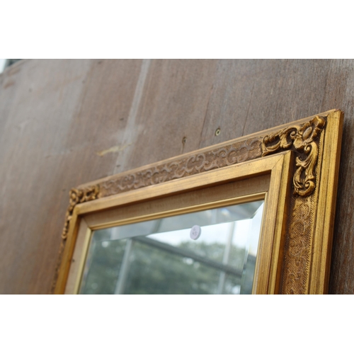 2791 - A MODERN GILT FRAMED BEVEL EDGE WALL MIRROR, 26