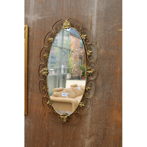 2792 - A MODERN OVAL BRASS FRAMED MIRROR, 29