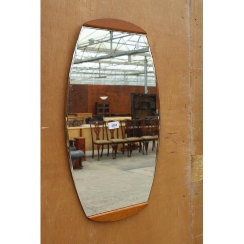 2799 - A RETRO FRAMELESS WALL MIRROR WITH TEAK TOP AND BASE, 26