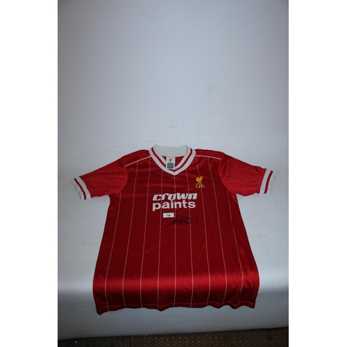 89 - A 1982 - 1988 LIVERPOOL FC FOOTBALL SHIRT SIGNED BY PAUL WALSH - WHIST WE BELIEVE THE SIGNATURE TO B... 