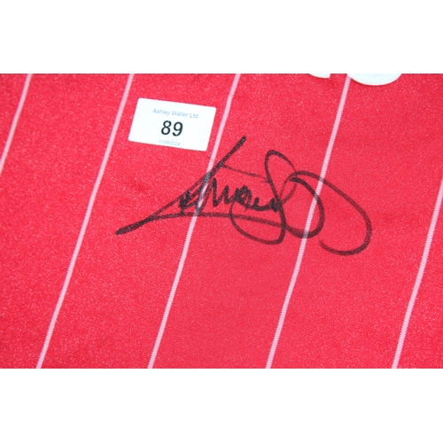 89 - A 1982 - 1988 LIVERPOOL FC FOOTBALL SHIRT SIGNED BY PAUL WALSH - WHIST WE BELIEVE THE SIGNATURE TO B... 