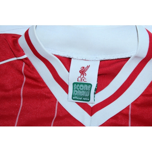 89 - A 1982 - 1988 LIVERPOOL FC FOOTBALL SHIRT SIGNED BY PAUL WALSH - WHIST WE BELIEVE THE SIGNATURE TO B... 