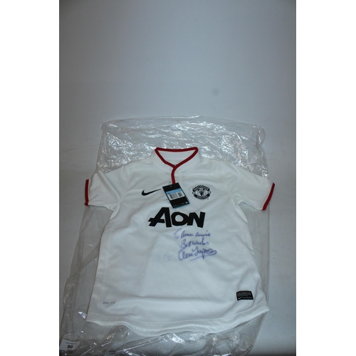 90 - A 2012 MANCHESTER UNITED FC FOOTBALL SHIRT SIGNED BY ALEX FERGUSON - WHIST WE BELIEVE THE SIGNATURE ... 