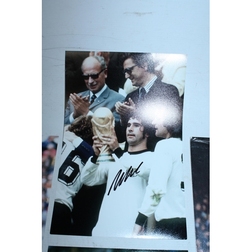 93 - FOUR SIGNED PHOTOGRAPHS OF INTERNATIONAL FOOTBALL PLAYERS - GERD MULLER, MICHEL PLATINE AMD JOHAN CR... 