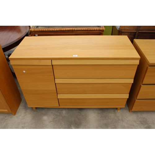 2846 - AN OAK EFFECT CHEST OF THREE DRAWERS ASLO ENCLOSING A CUPBOARD 47