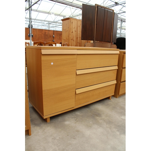 2846 - AN OAK EFFECT CHEST OF THREE DRAWERS ASLO ENCLOSING A CUPBOARD 47