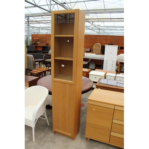 2847 - AN OAK EFFECT CUPBOARD WITH GLAZED UPPER PORTION 15.5