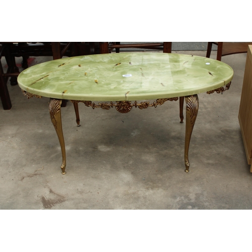 2852 - AN ONYX EFFECT OVAL COFFEE TABLE