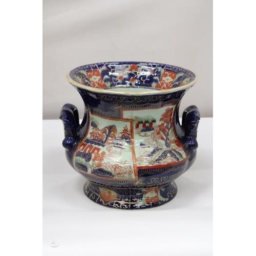 217 - AN ANTIQUE VICTORIA WARE IRONSTONE POTTERY PLANTER WITH AN ORIENTAL SCENE