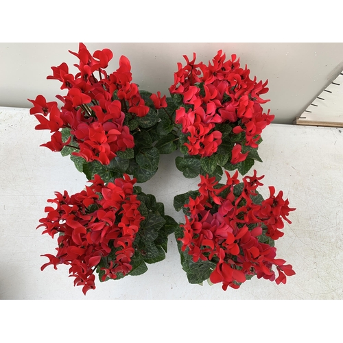 9 - FOUR RED CYCLAMEN IN 9CM POTS APPROX 30CM IN HEIGHT IN FLOWER. PLUS VAT TO BE SOLD FOR THE FOUR