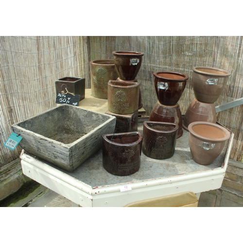 12 - DISPLAY STAND AND FOURTEEN TERRACOTTA POTS PLUS VAT