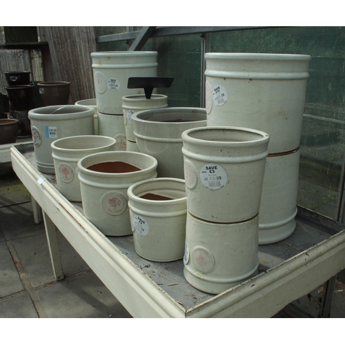 13 - DISPLAY STAND AND FIFTEEN CREAM TERRACOTTA POTS PLUS VAT