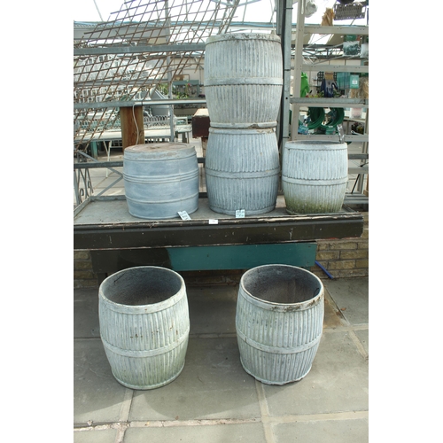 18 - BENCH AND SIX RUSTIC IMITATION DOLLY TUBS PLUS VAT