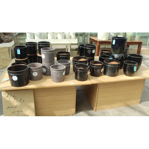 20 - TWO DISPLAY STANDS AND THIRTY BLACK AND GREY TERRACOTTA POTS  PLUS VAT