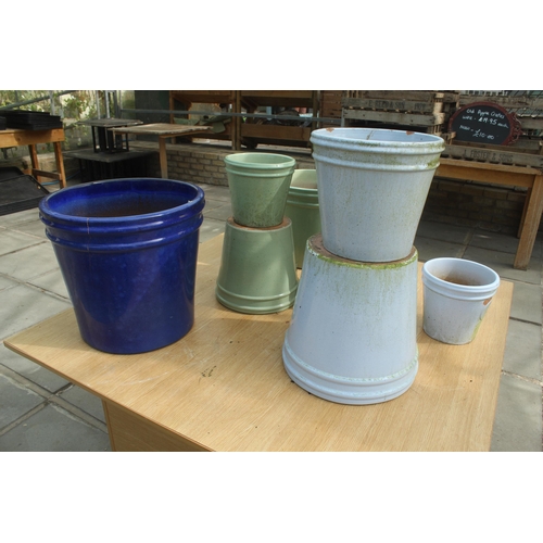 21 - DISPLAY STAND AND NINE ASSORTED POTS DAMAGED  PLUS VAT