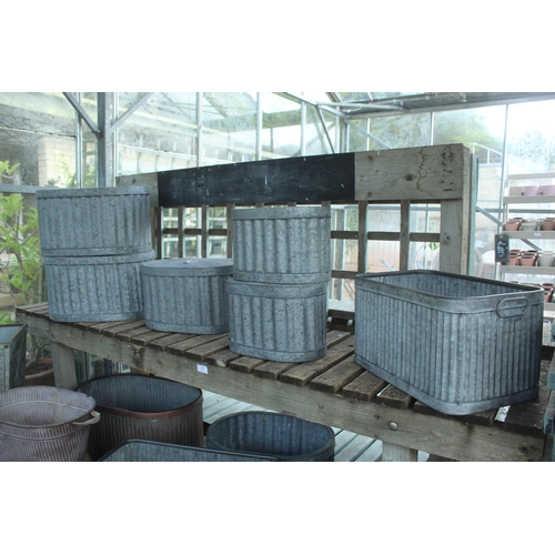 33 - DISPLAY STAND AND FIFTEEN METAL POTS  PLUS VAT