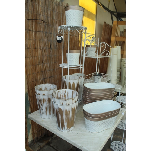 4 - TABLE PLUS FOUR DISPLAY STANDS AND 26 GOLD 
/WHITE METAL POTS PLUS VAT