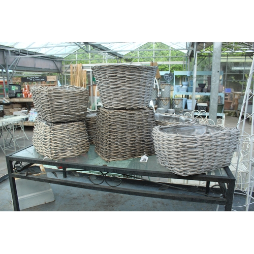 48 - DISPLAY STAND GLASS TABLE 7 BASKETS AND NINE OBELISKS  PLUS VAT