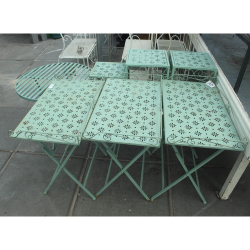 49 - SEVEN GREEN METAL DECORATIVE DISPLAY TABLES PLUS VAT