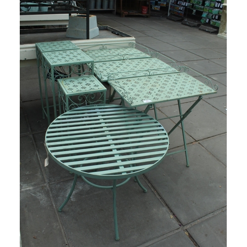 49 - SEVEN GREEN METAL DECORATIVE DISPLAY TABLES PLUS VAT