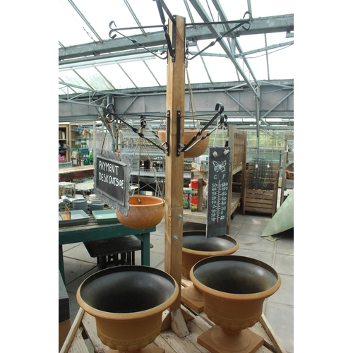 57 - WOODEN HANGING BASKET STAND TO INCLUDE POTS ETC. PLUS VAT