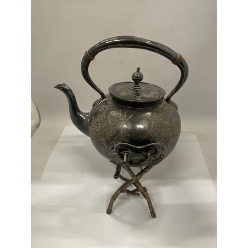 32 - A BULBOUS SILVER PLATED SPIRIT KETTLE WITH STAND