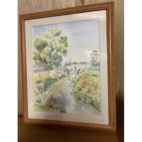 121 - A FRAMED WATER COLOUR OF A BRIDGE AND RIVER SCENE SIGNED MARY FOX '97 TO LOWER RIGHT HAND CORNER 50C... 