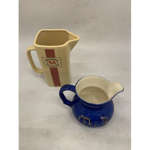 129 - A VINTAGE WADE REGICOR M & B WATER JUG AND WHYTE & MACKAY JUG