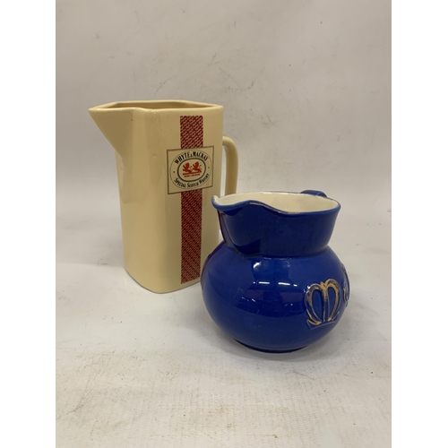 129 - A VINTAGE WADE REGICOR M & B WATER JUG AND WHYTE & MACKAY JUG