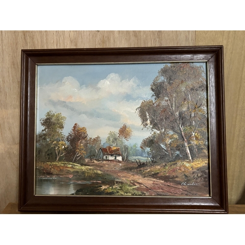 160 - A FRAMED OIL ON CANVAS OF A WOODLAND COTTAGE SCENE SIGNED TO LOWER RIGHT HAND CORNER 32CM X 41CM