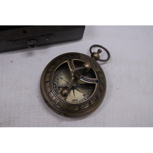 234 - A BOXED BRASS SUNDIAL AND COMPASS