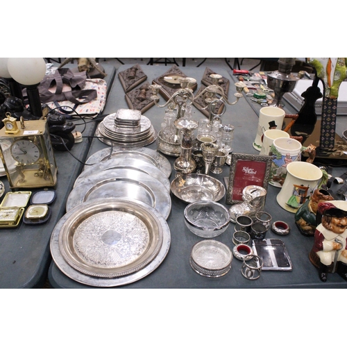 355 - A LARGE QUANTITY OF SILVER PLATED ITEMS TO INCLUDE TRAYS, CANDLEABRAS, TWO CONDIMENT SETS WITH GLASS... 