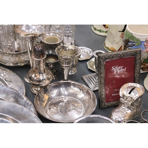 355 - A LARGE QUANTITY OF SILVER PLATED ITEMS TO INCLUDE TRAYS, CANDLEABRAS, TWO CONDIMENT SETS WITH GLASS... 