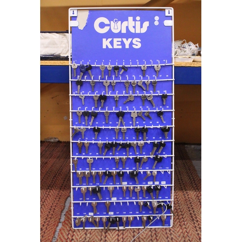 399 - A 'CURTIS KEYS', KEY RACK WITH OVER 100 KEYS, HEIGHT 99CM, WIDTH 46CM