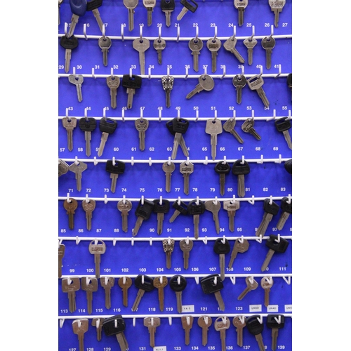 399 - A 'CURTIS KEYS', KEY RACK WITH OVER 100 KEYS, HEIGHT 99CM, WIDTH 46CM