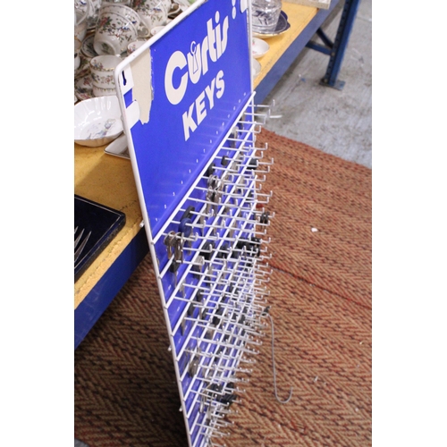 399 - A 'CURTIS KEYS', KEY RACK WITH OVER 100 KEYS, HEIGHT 99CM, WIDTH 46CM