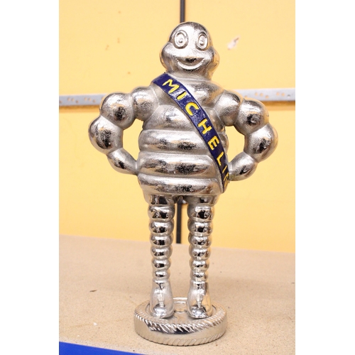 418 - A LARGE CHROME MICHELIN MAN, HEIGHT 37CM