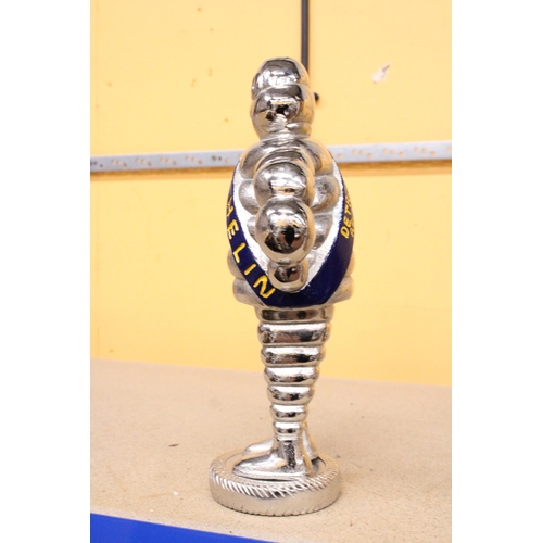 418 - A LARGE CHROME MICHELIN MAN, HEIGHT 37CM