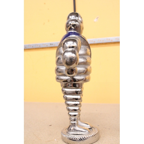 418 - A LARGE CHROME MICHELIN MAN, HEIGHT 37CM