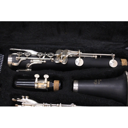 494 - AN ELKHART CLARINET AND CASE