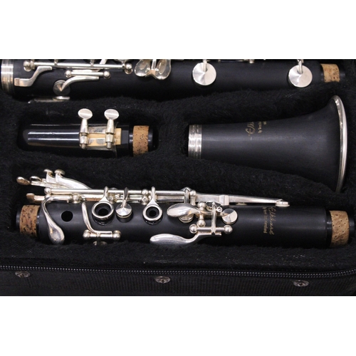 494 - AN ELKHART CLARINET AND CASE