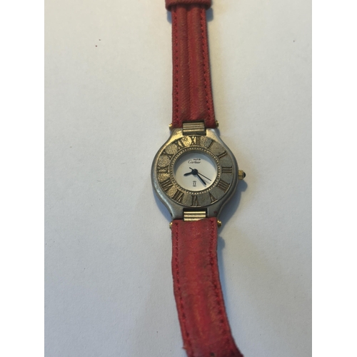 503 - A VINTAGE MUST DE CARTIER STAINLESS STEEL LADIES WRIST WATCH WITH RED LEATHER STRAP